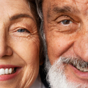 zoomed in view of an older couple smiling